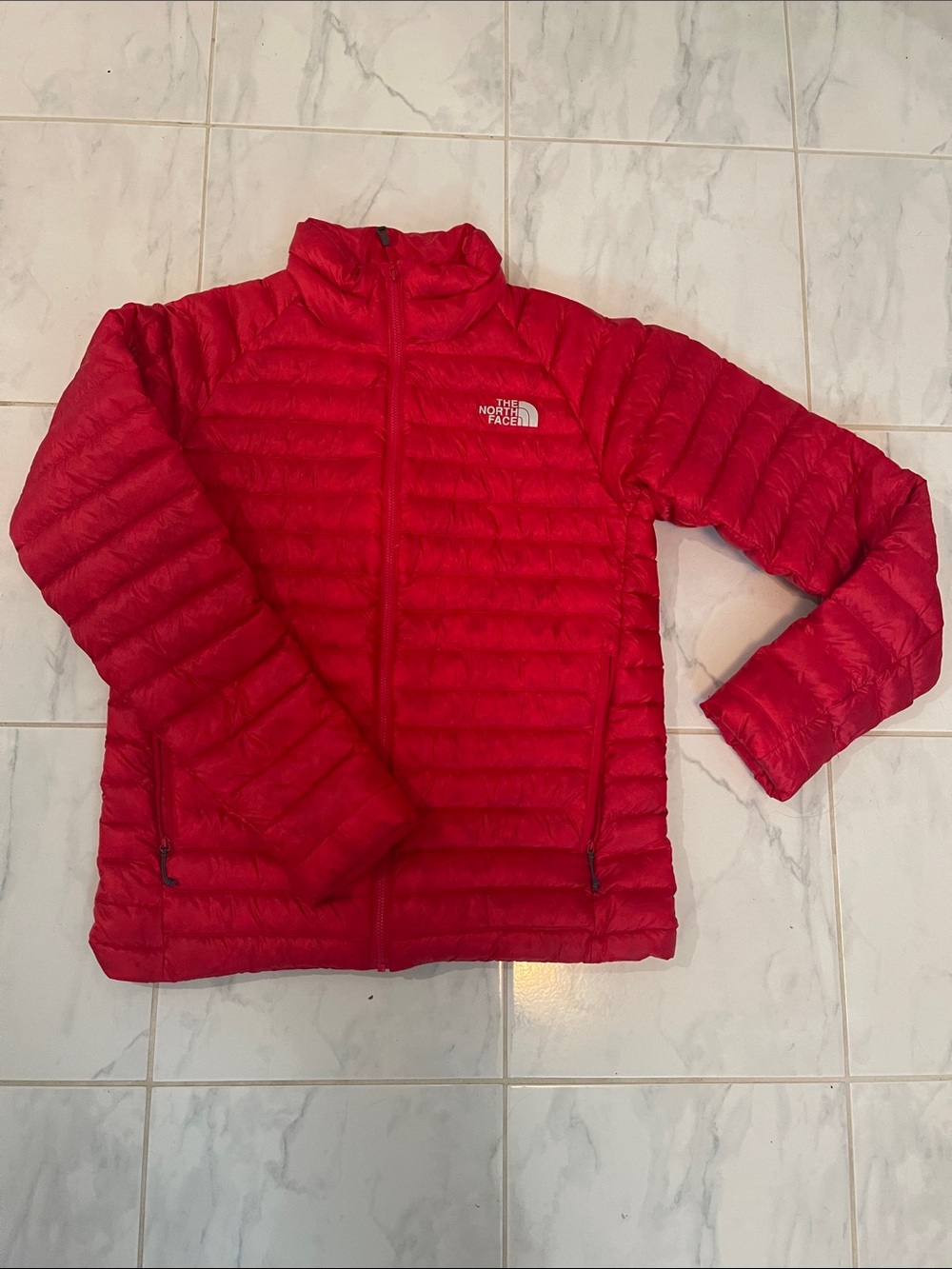 The North Face Bright Red Puffer Jacket with silver Logo.  Zip up. 800
